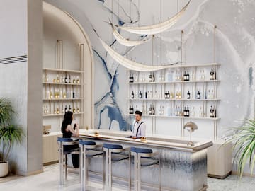 a man and woman at a bar