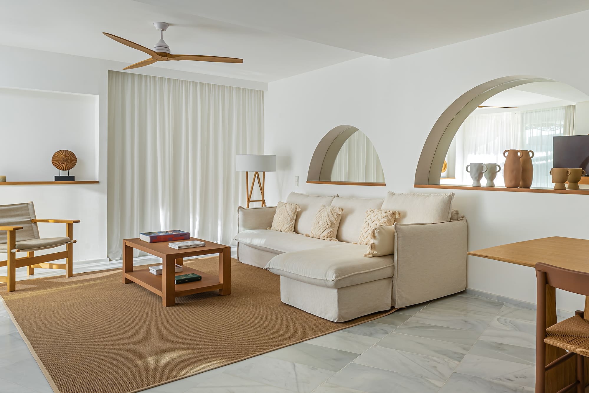 a living room with a couch and a table