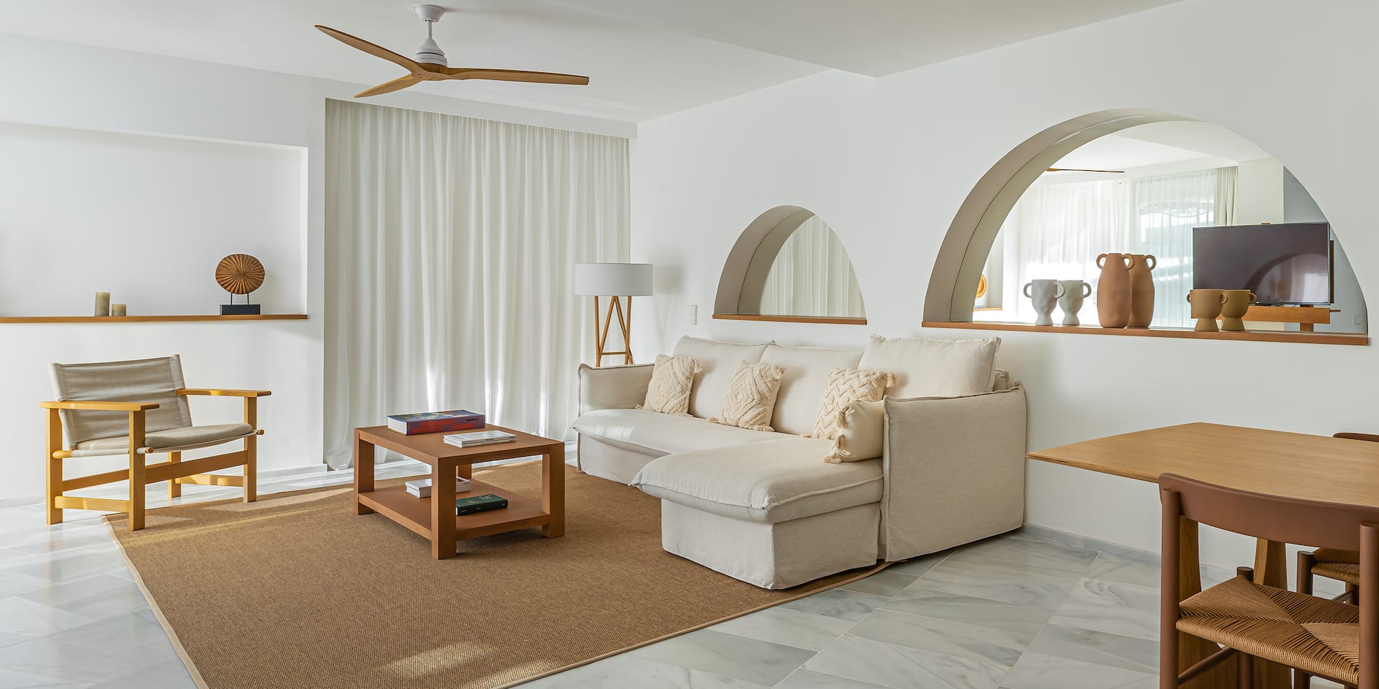 a living room with a couch and a table