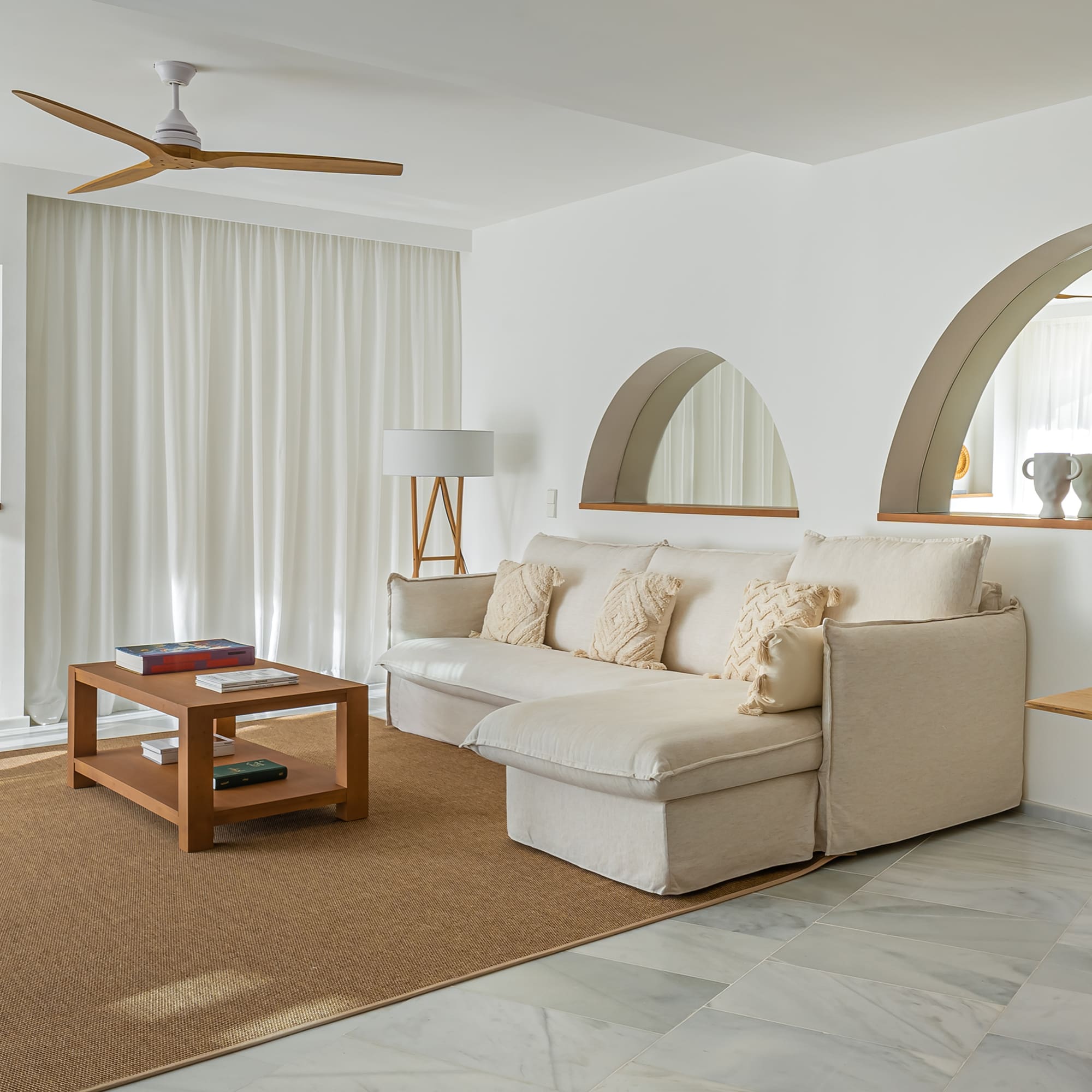 a living room with a couch and a table