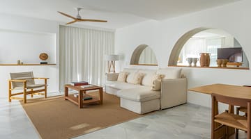 a living room with a couch and a table