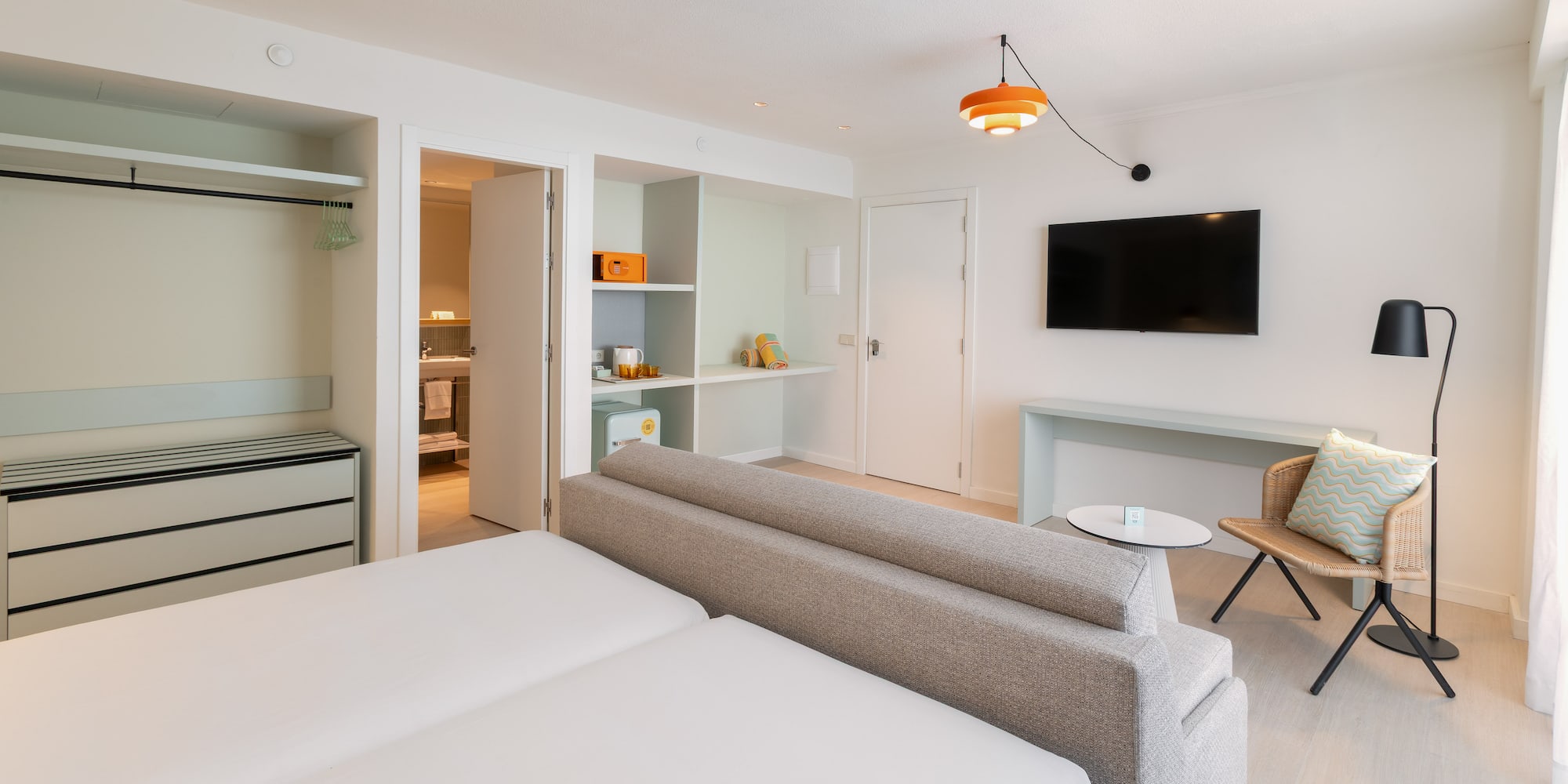 a room with a tv and a couch