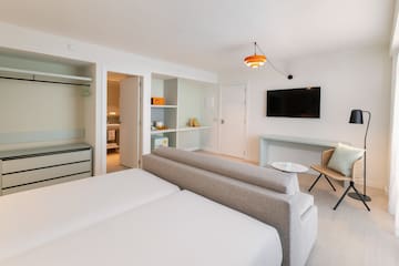 a room with a tv and a couch