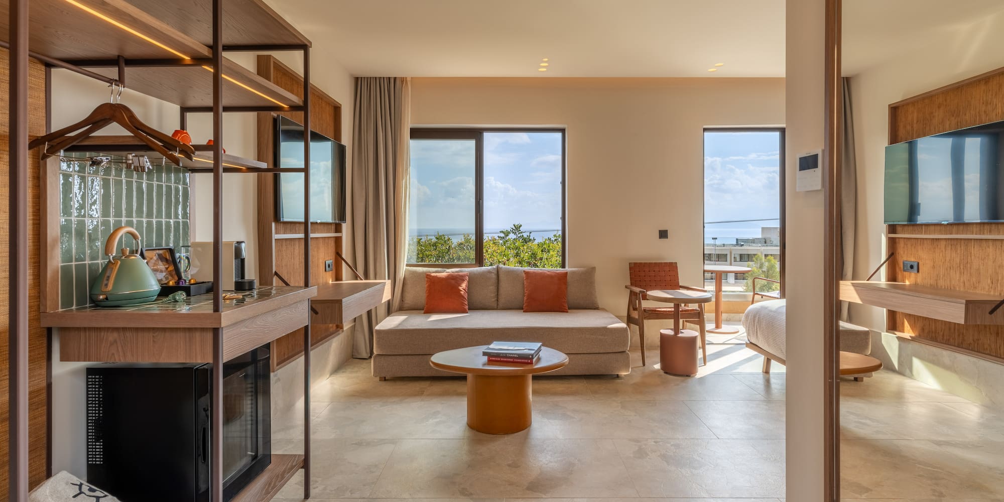 a room with a couch and a fireplace