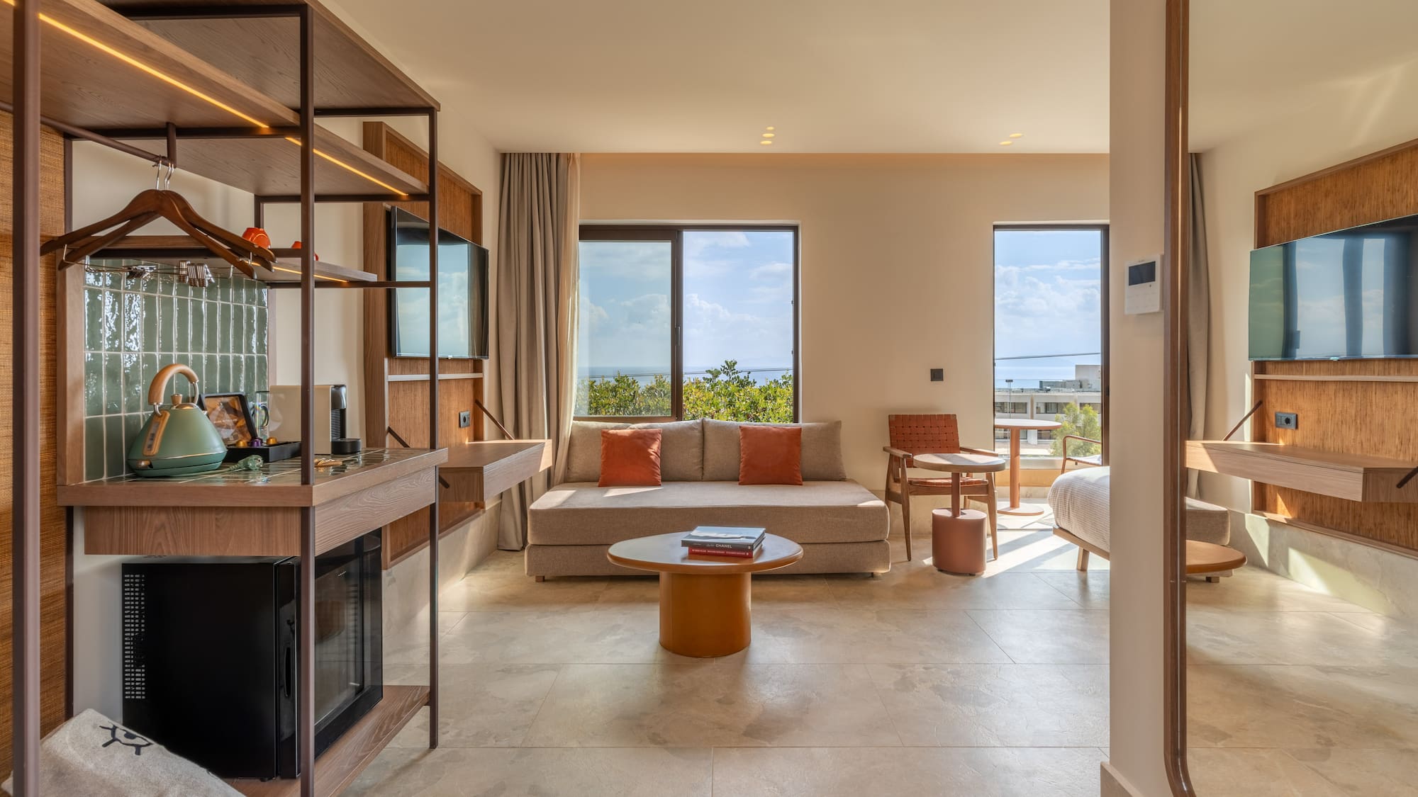 a room with a couch and a fireplace