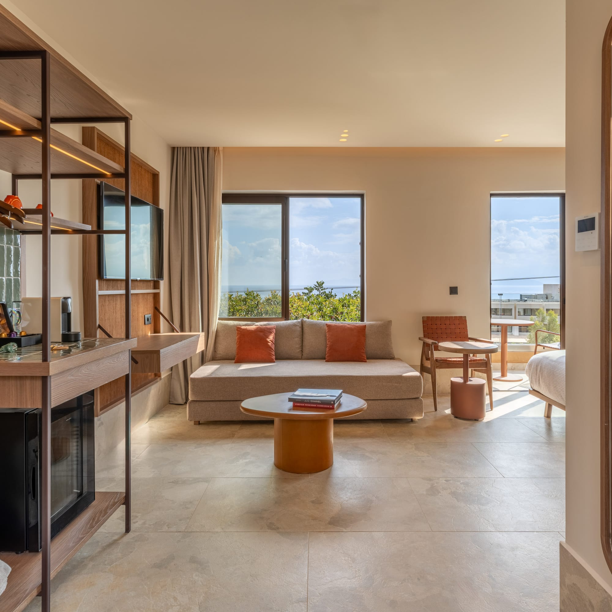 a room with a couch and a fireplace