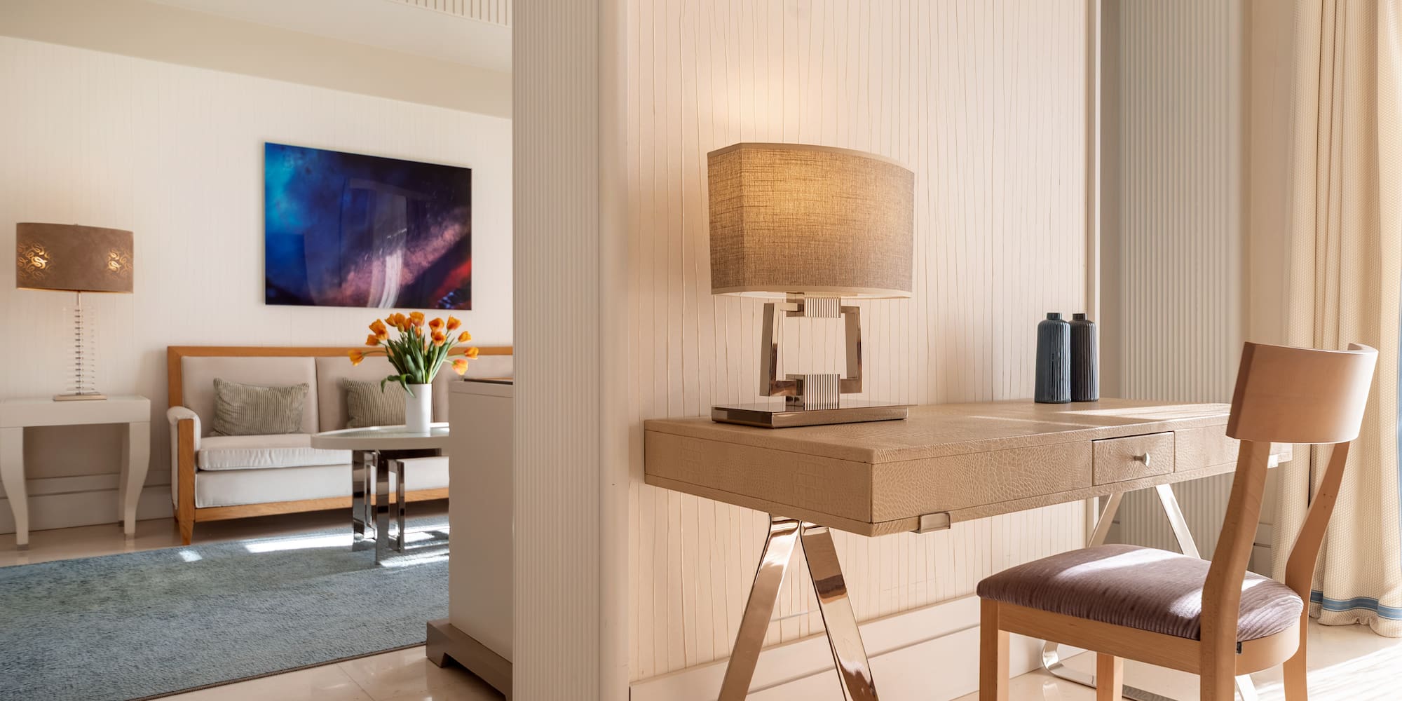 a desk and chair in a room