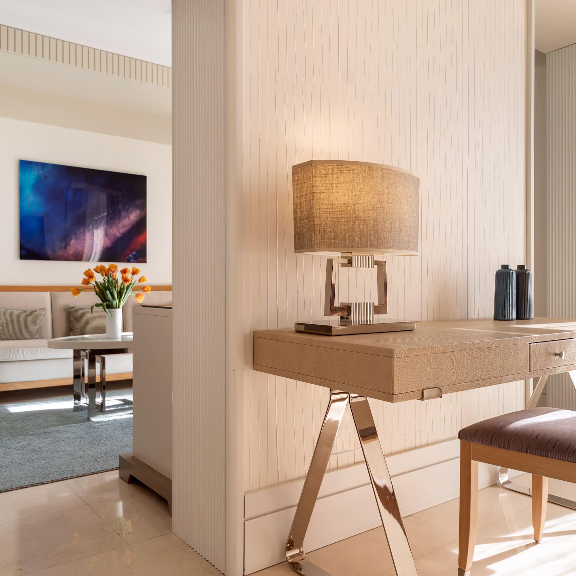 a desk and chair in a room