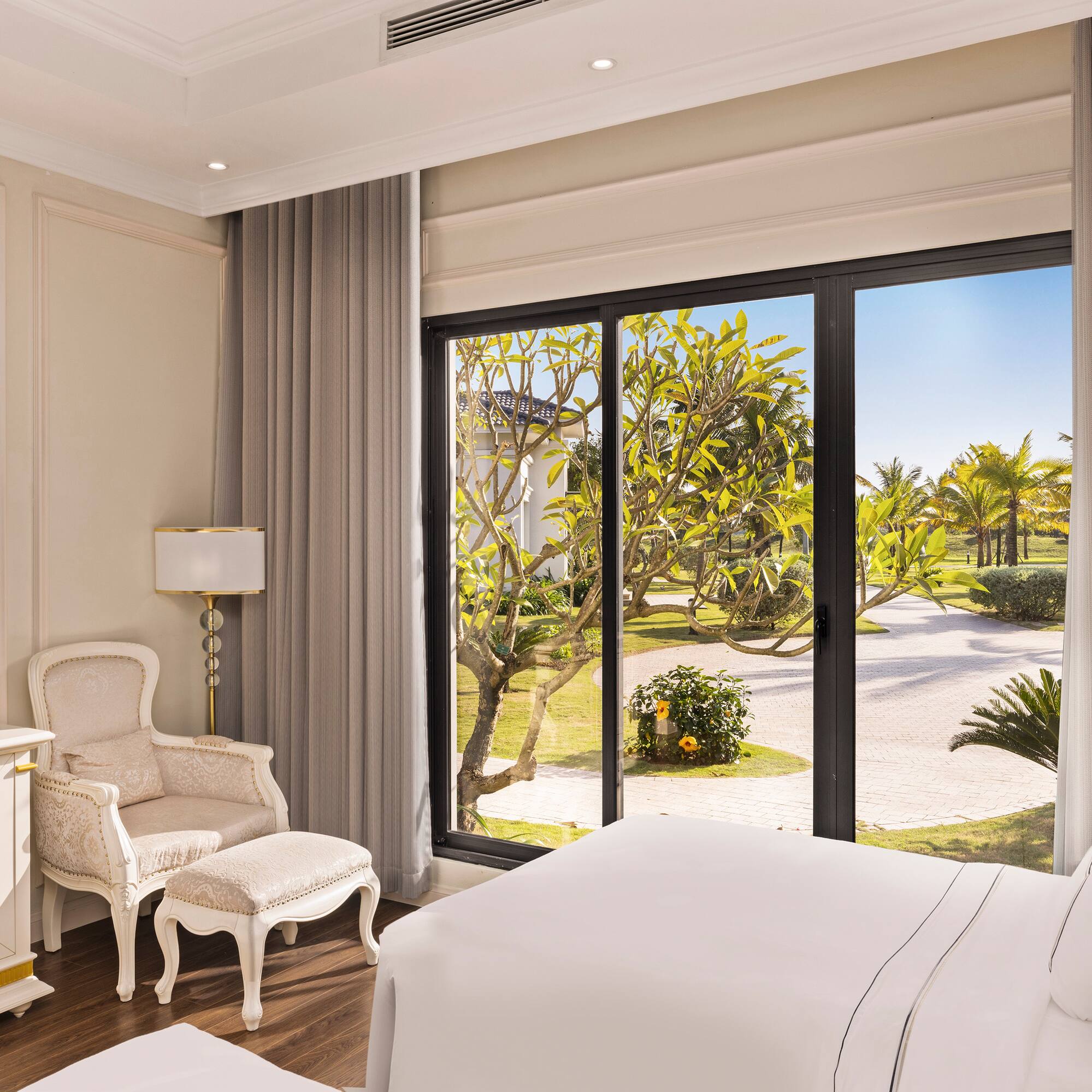 a bedroom with a large window