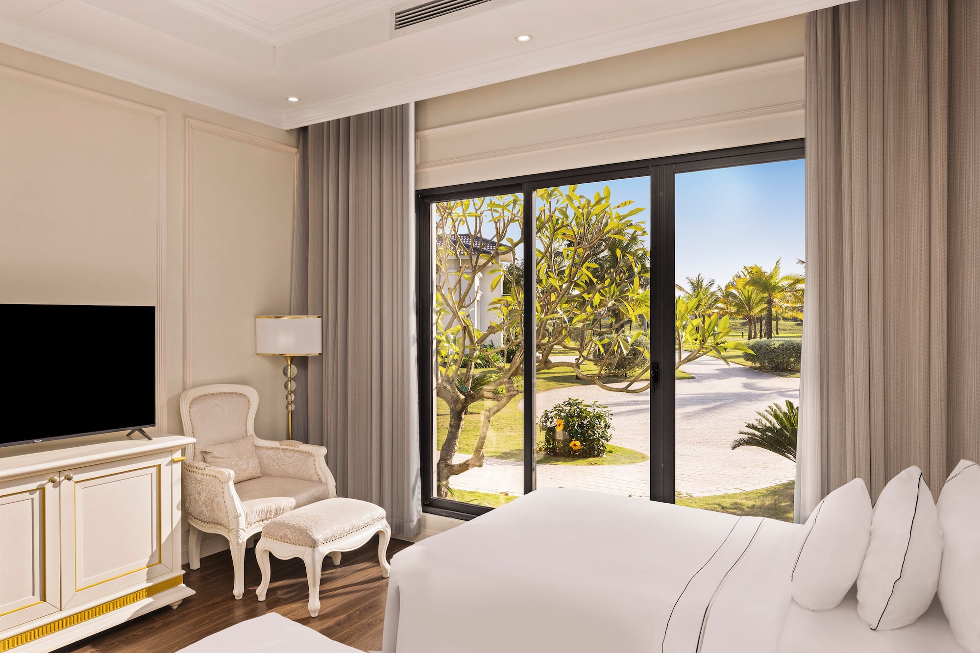 a bedroom with a large window