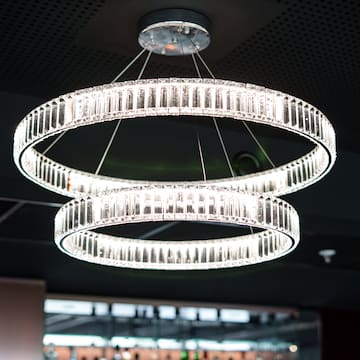 a chandelier with crystal rings from the ceiling