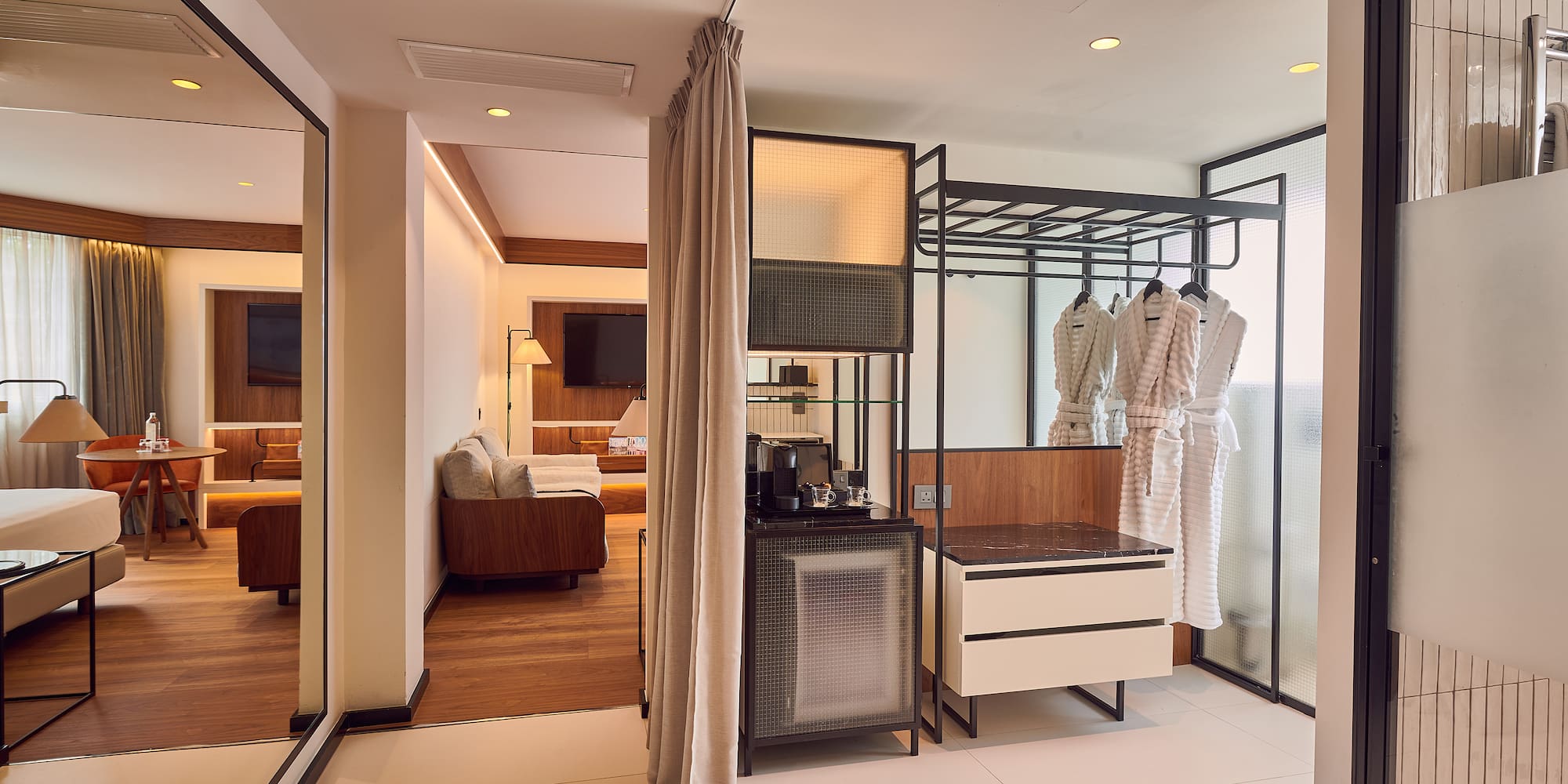 a room with a large closet and a tv