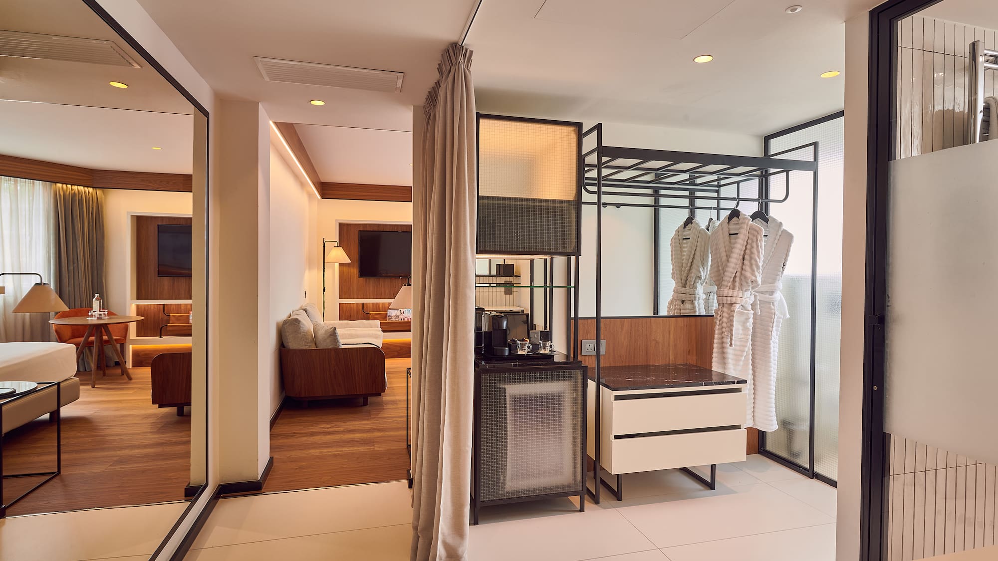 a room with a large closet and a tv