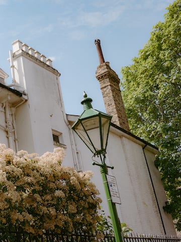 a street lamp next to a building