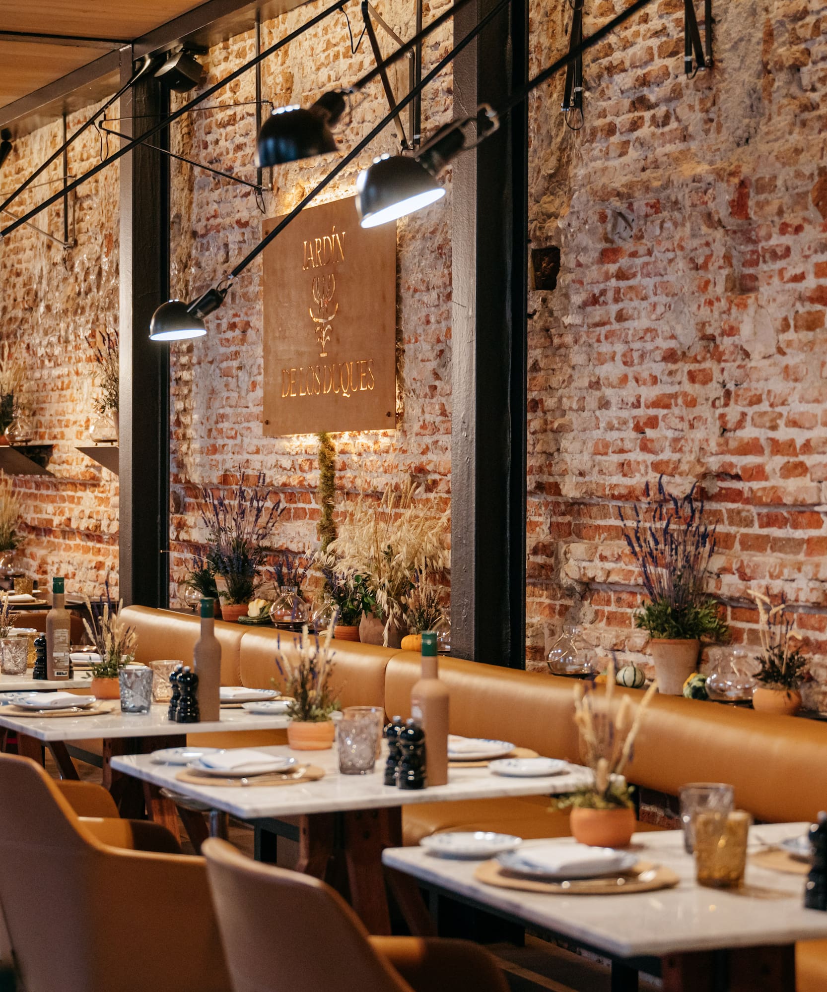 a restaurant with tables and chairs