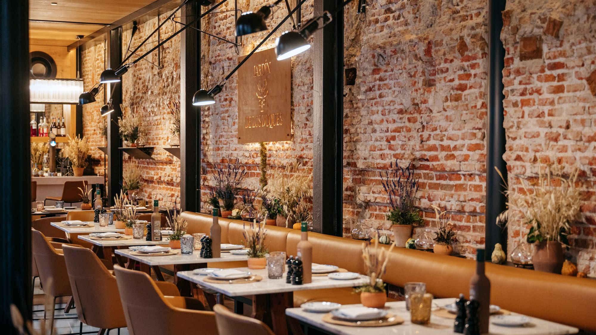 a restaurant with tables and chairs