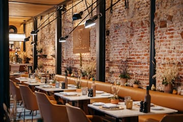 a restaurant with tables and chairs