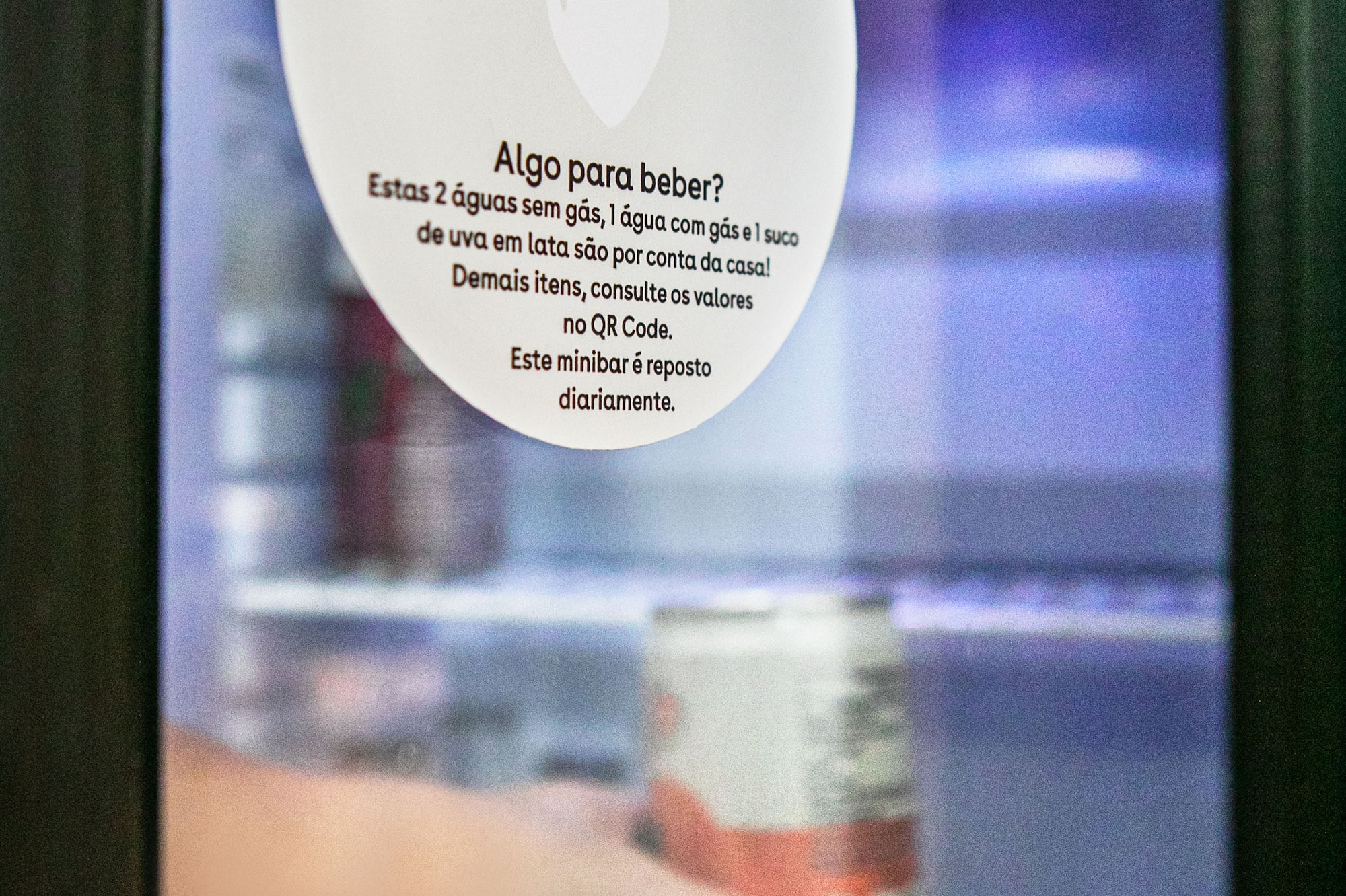 a sign on a glass door