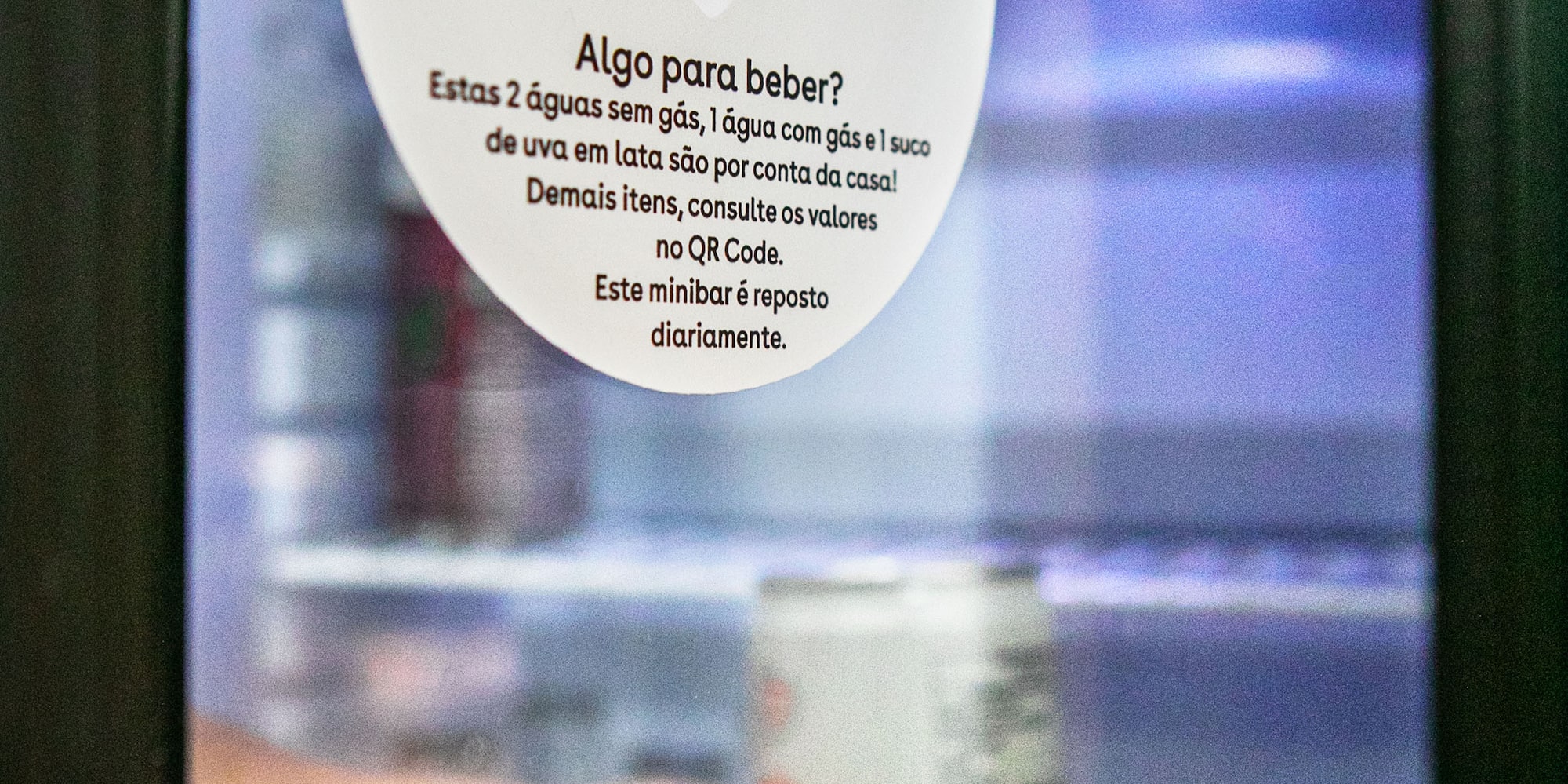 a sign on a glass door