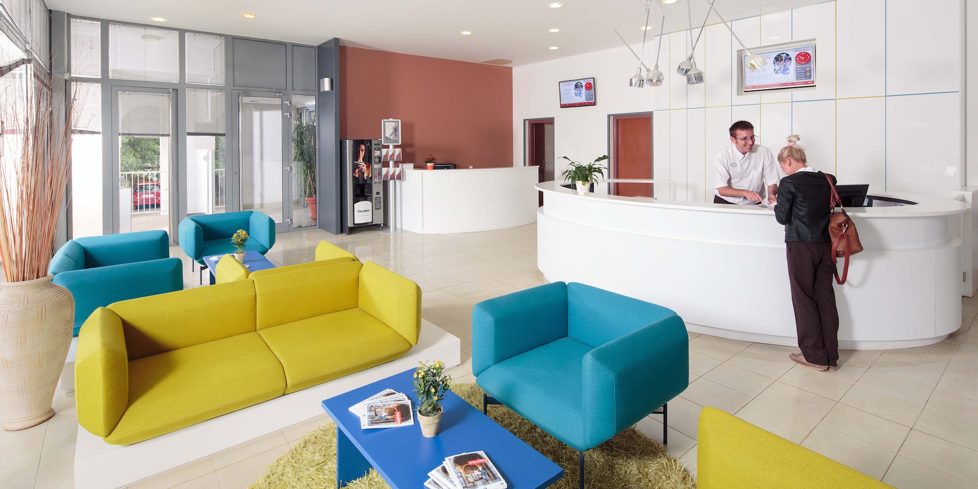 a reception desk in a hotel