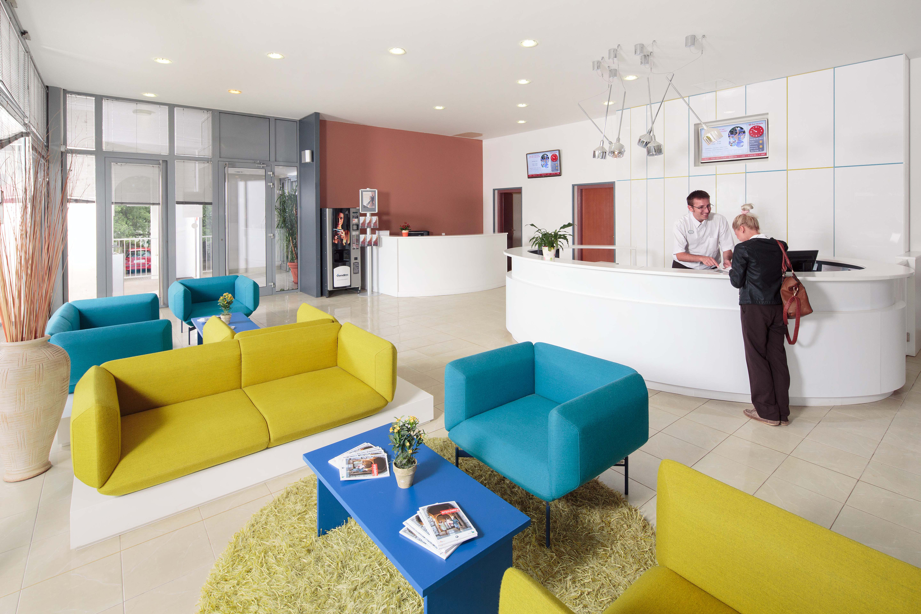 a reception desk in a hotel