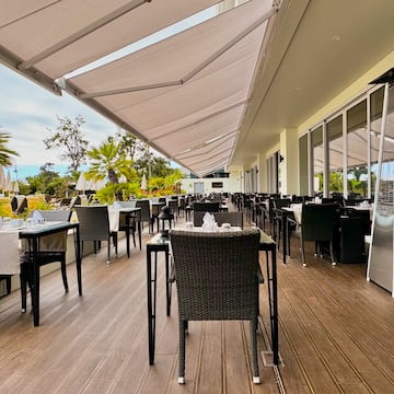 a restaurant with tables and chairs