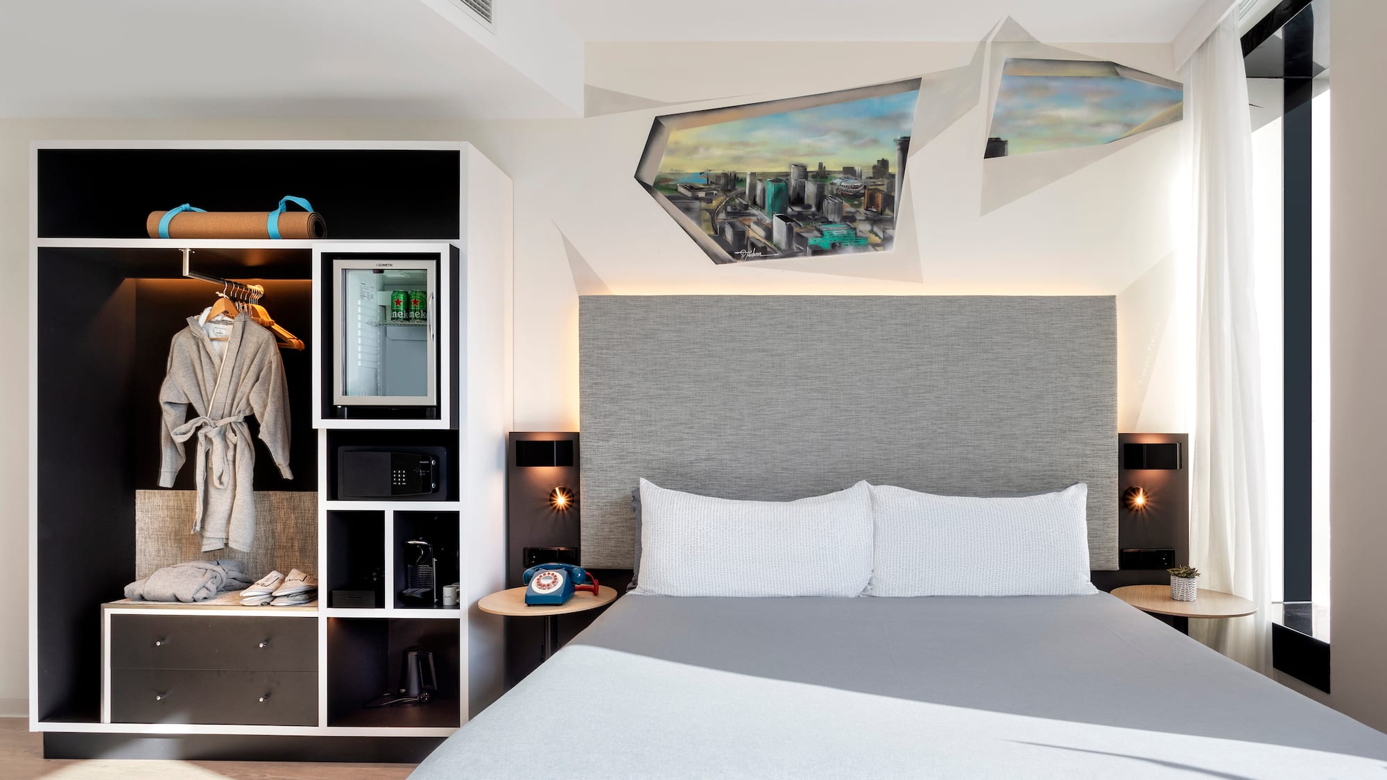 a room with a bed and a shelf