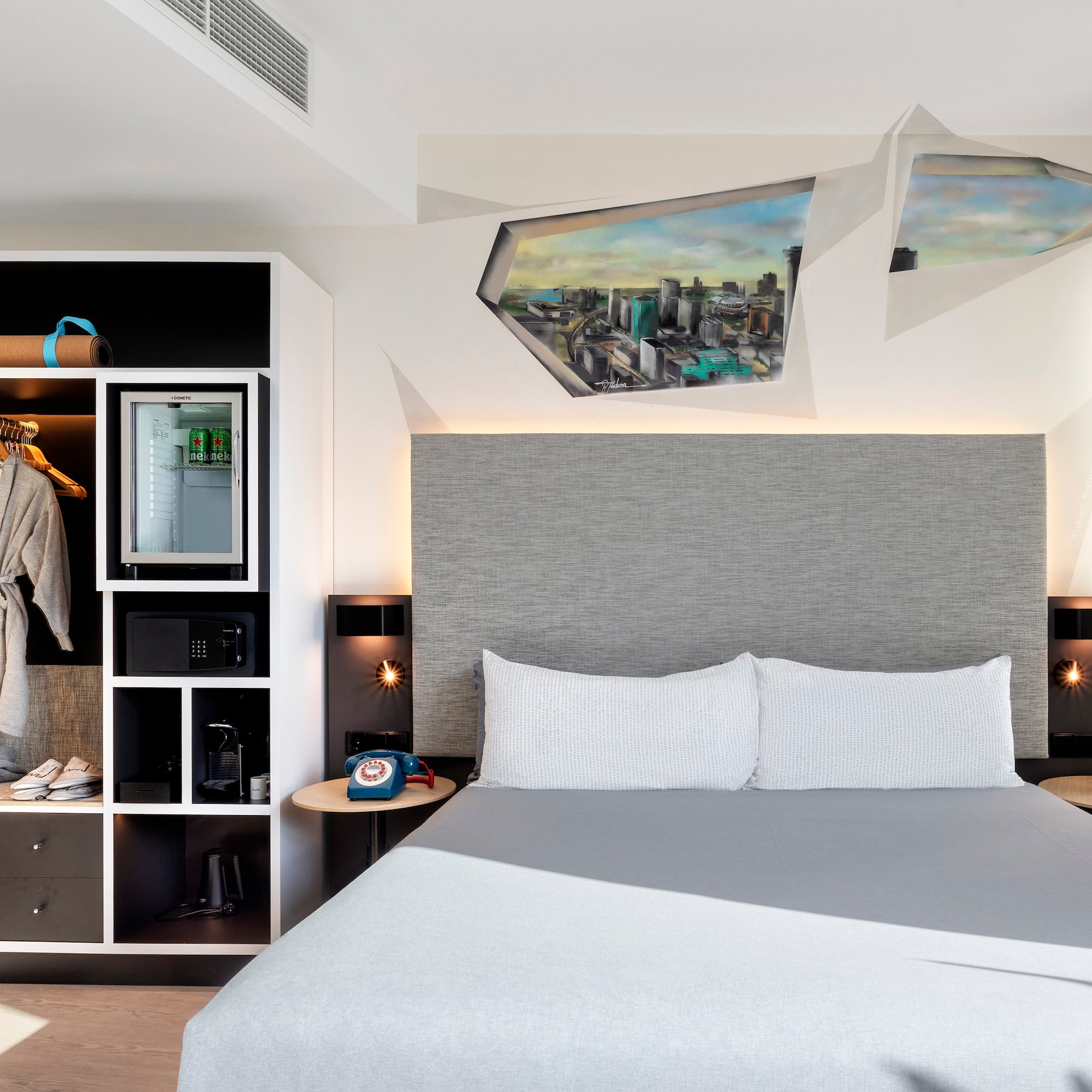 a room with a bed and a shelf