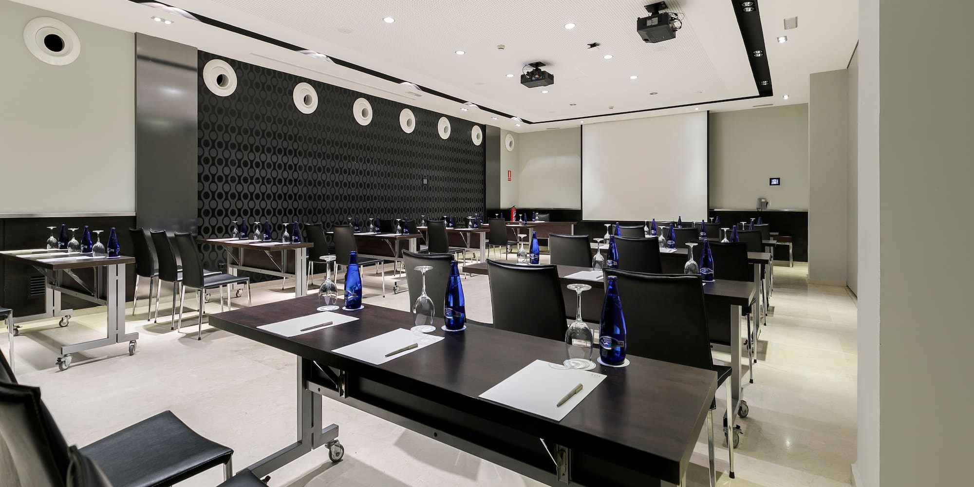 a room with tables and chairs