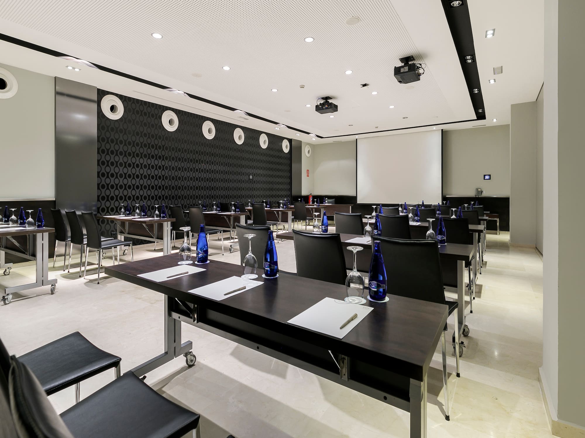 a room with tables and chairs