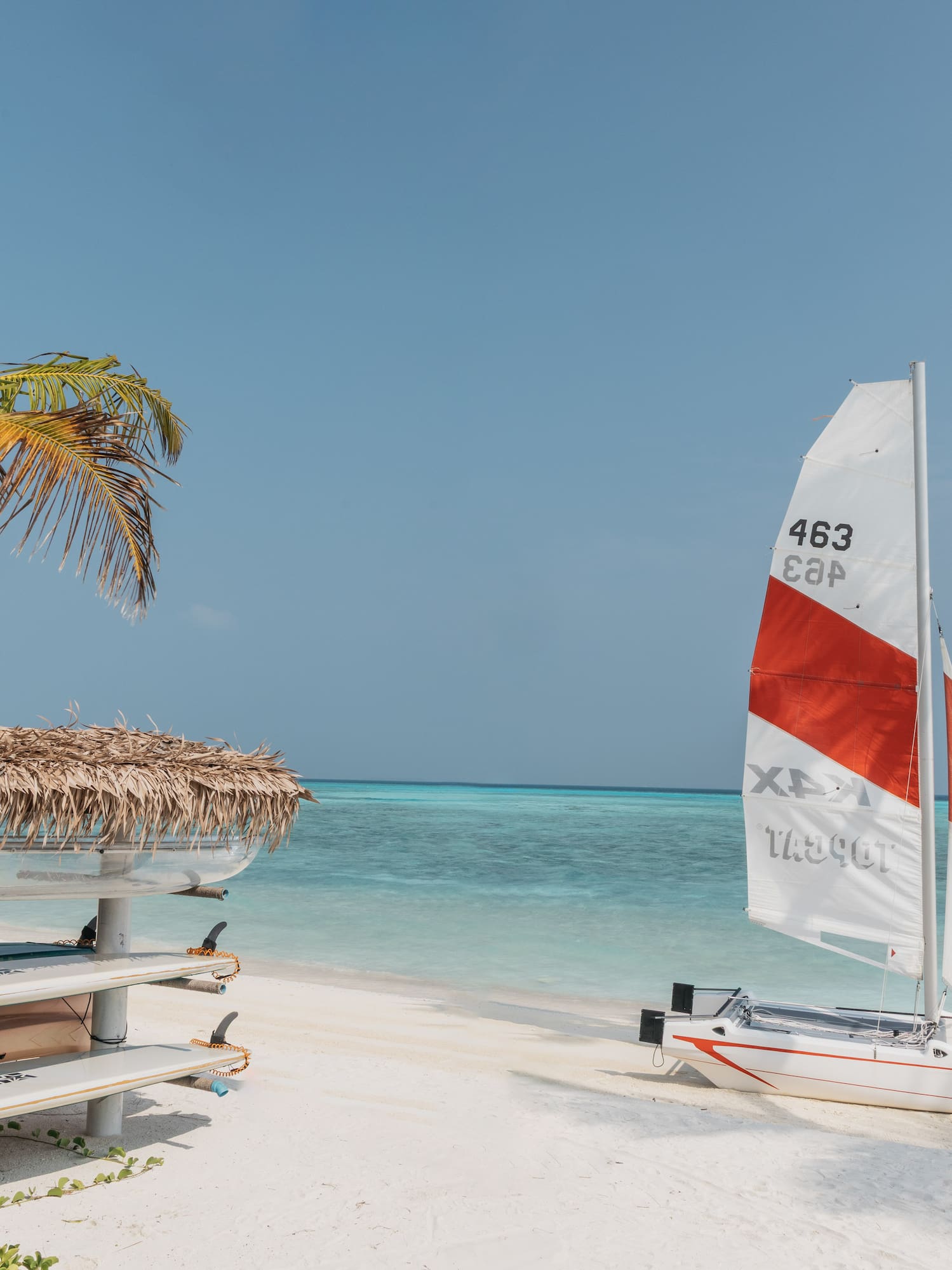 a sailboat on a beach