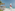 a sailboat on a beach