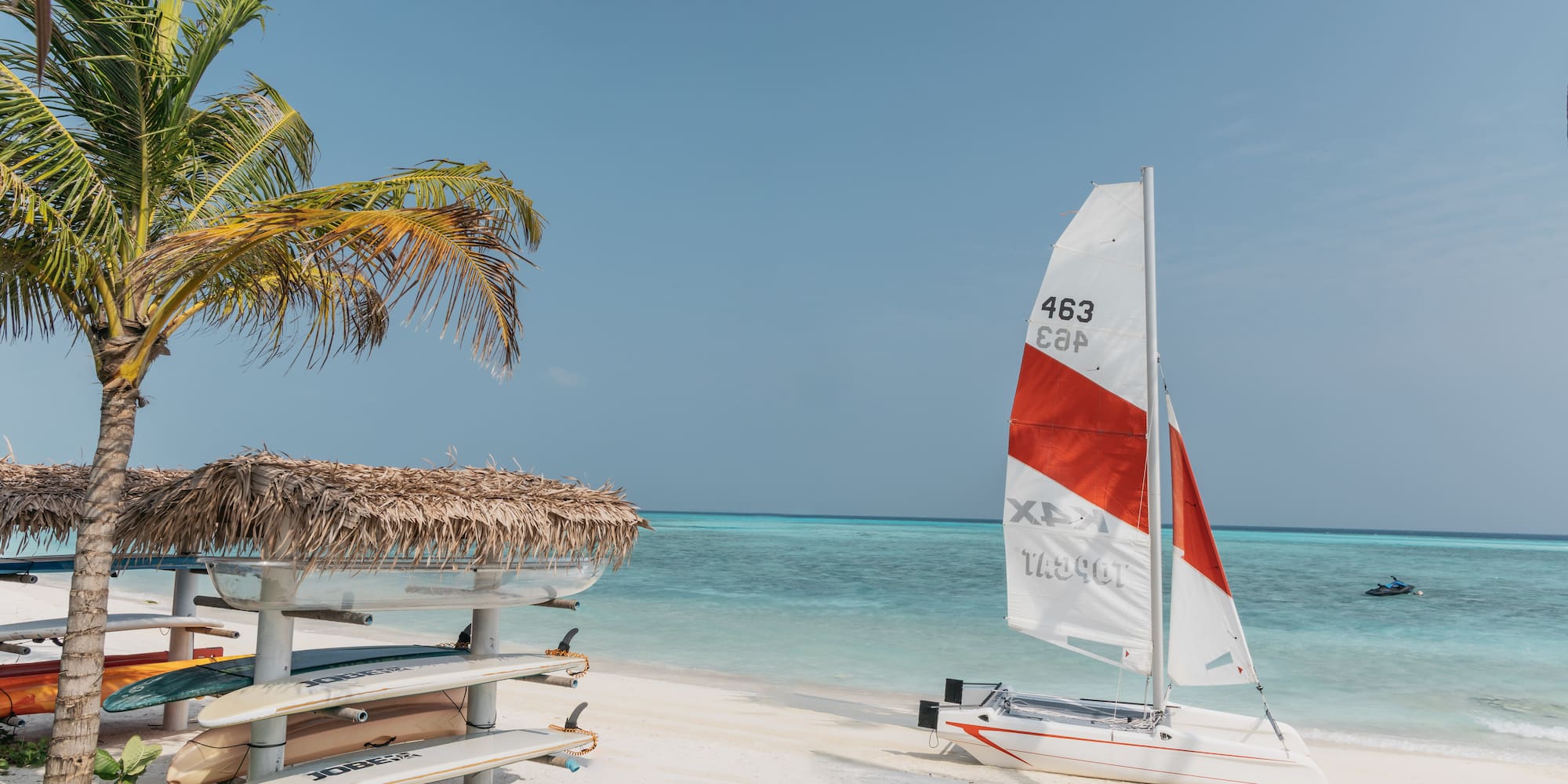 a sailboat on a beach