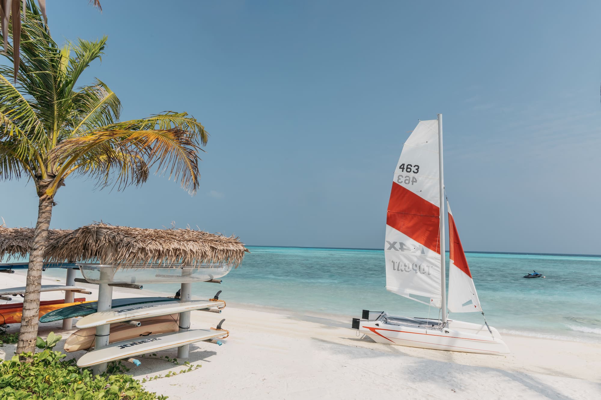 a sailboat on a beach