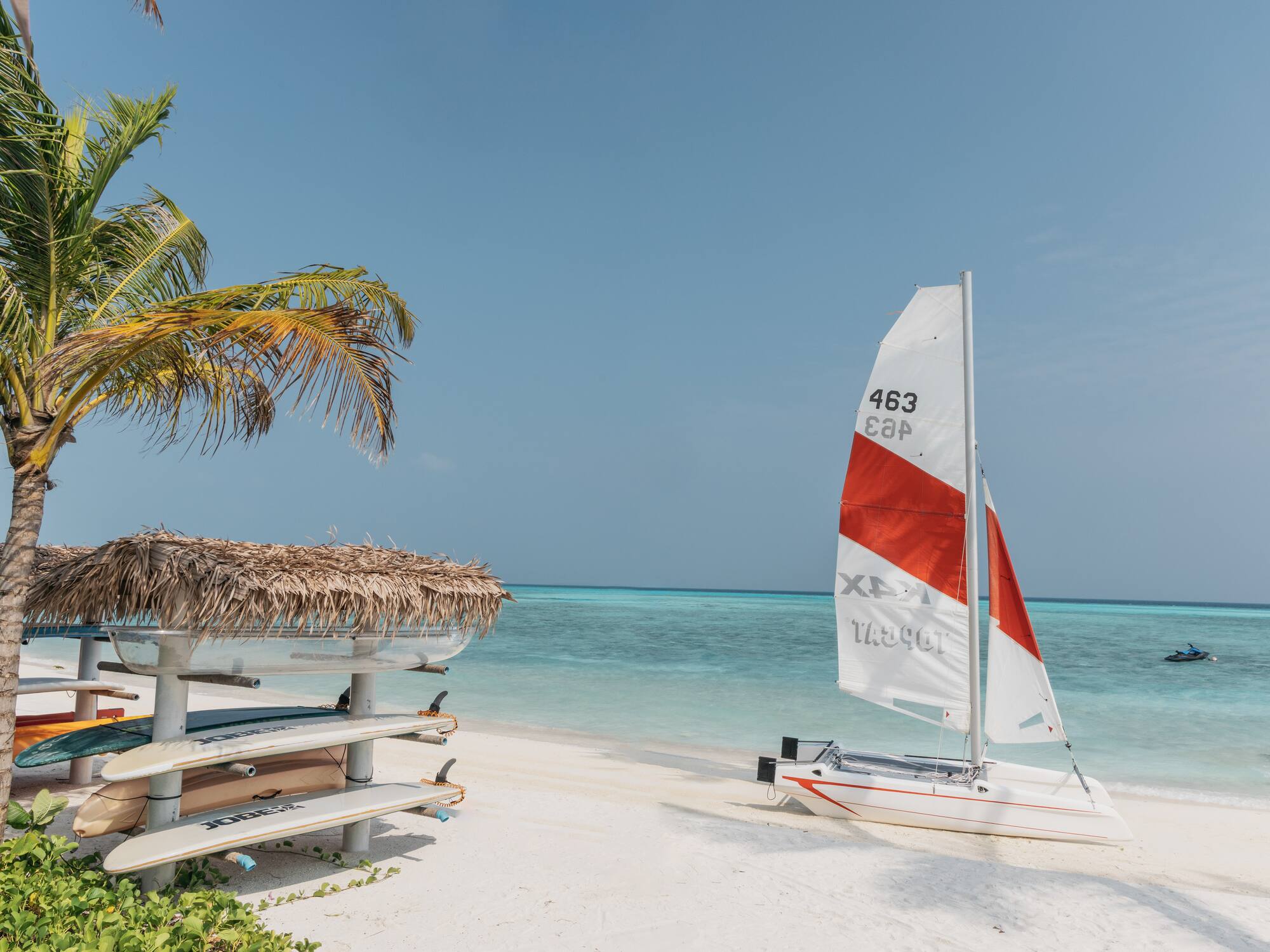 a sailboat on a beach