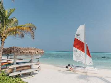 a sailboat on a beach