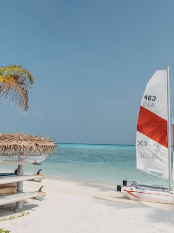 a sailboat on a beach