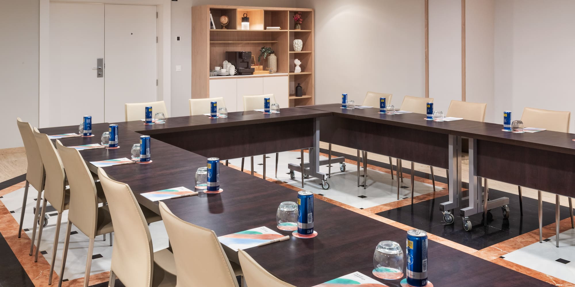 a room with a table and chairs