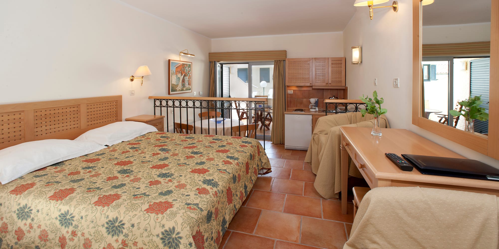 a room with a bed and a desk