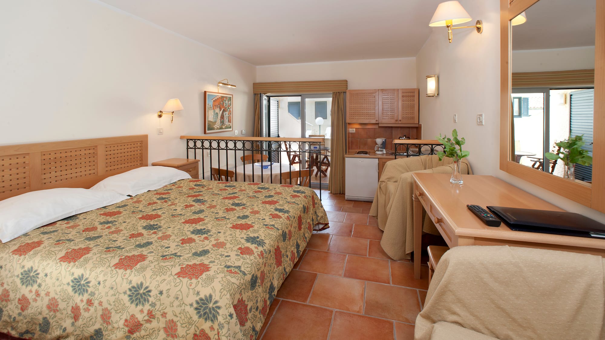 a room with a bed and a desk