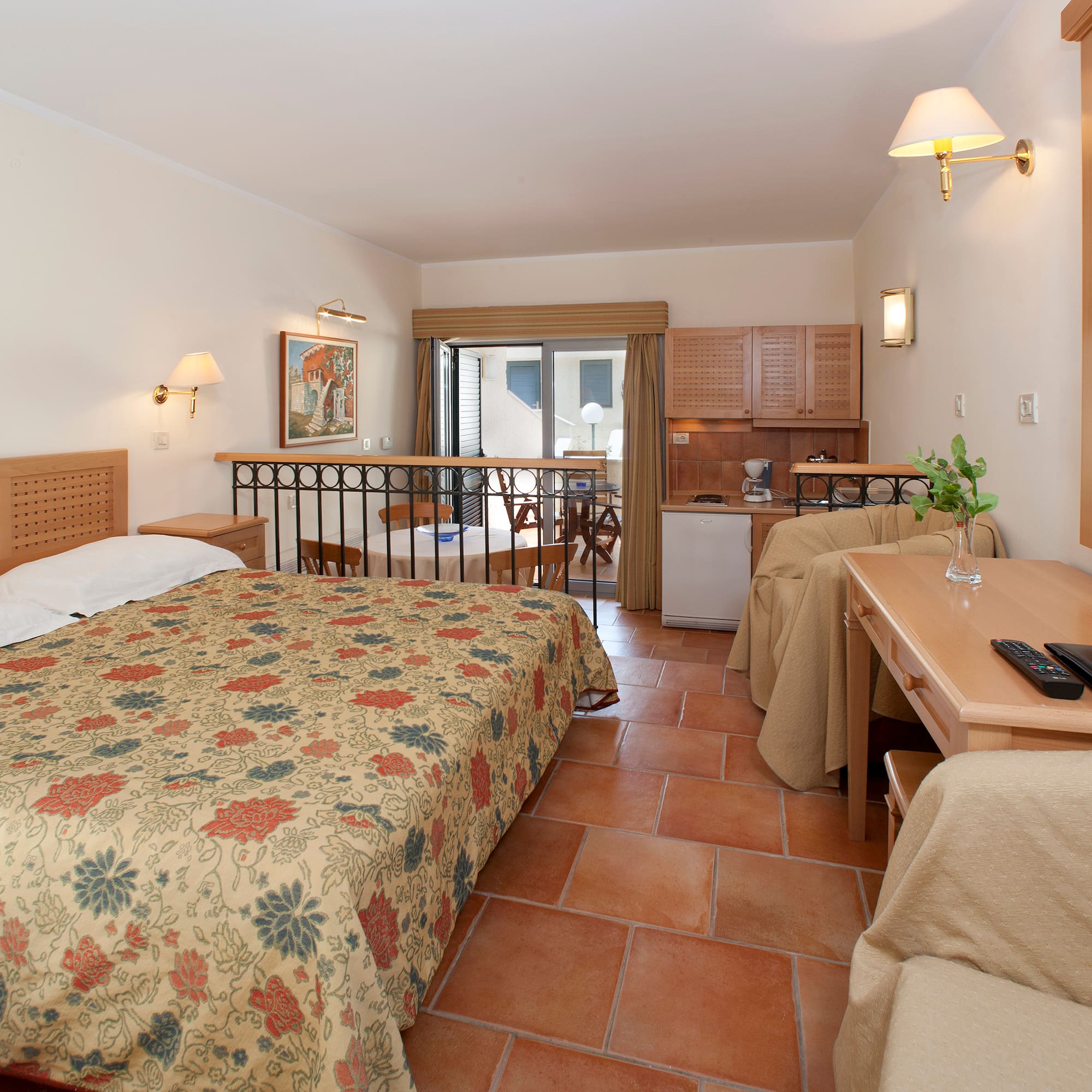 a room with a bed and a desk