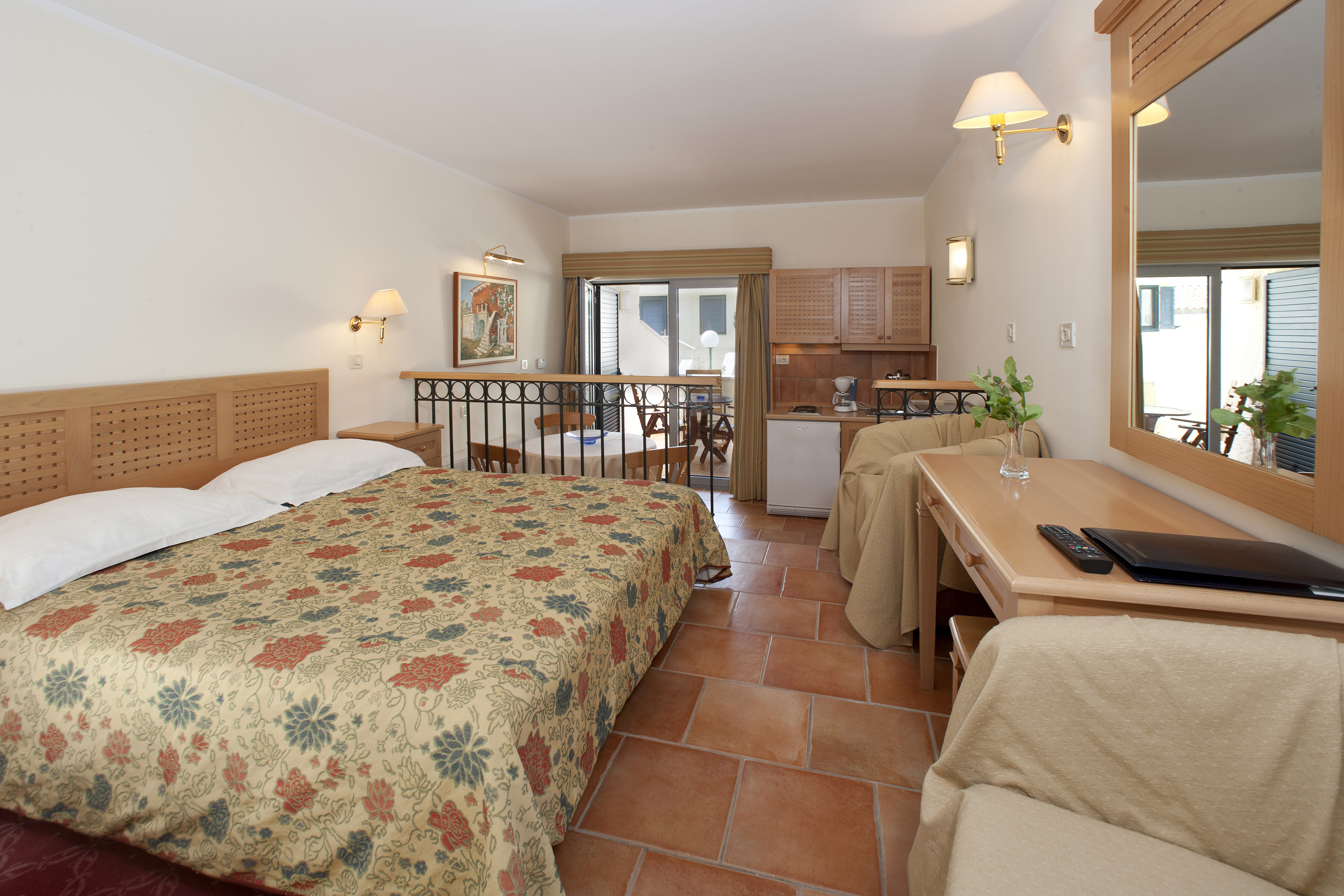 a room with a bed and a desk