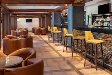 a room with chairs and tables