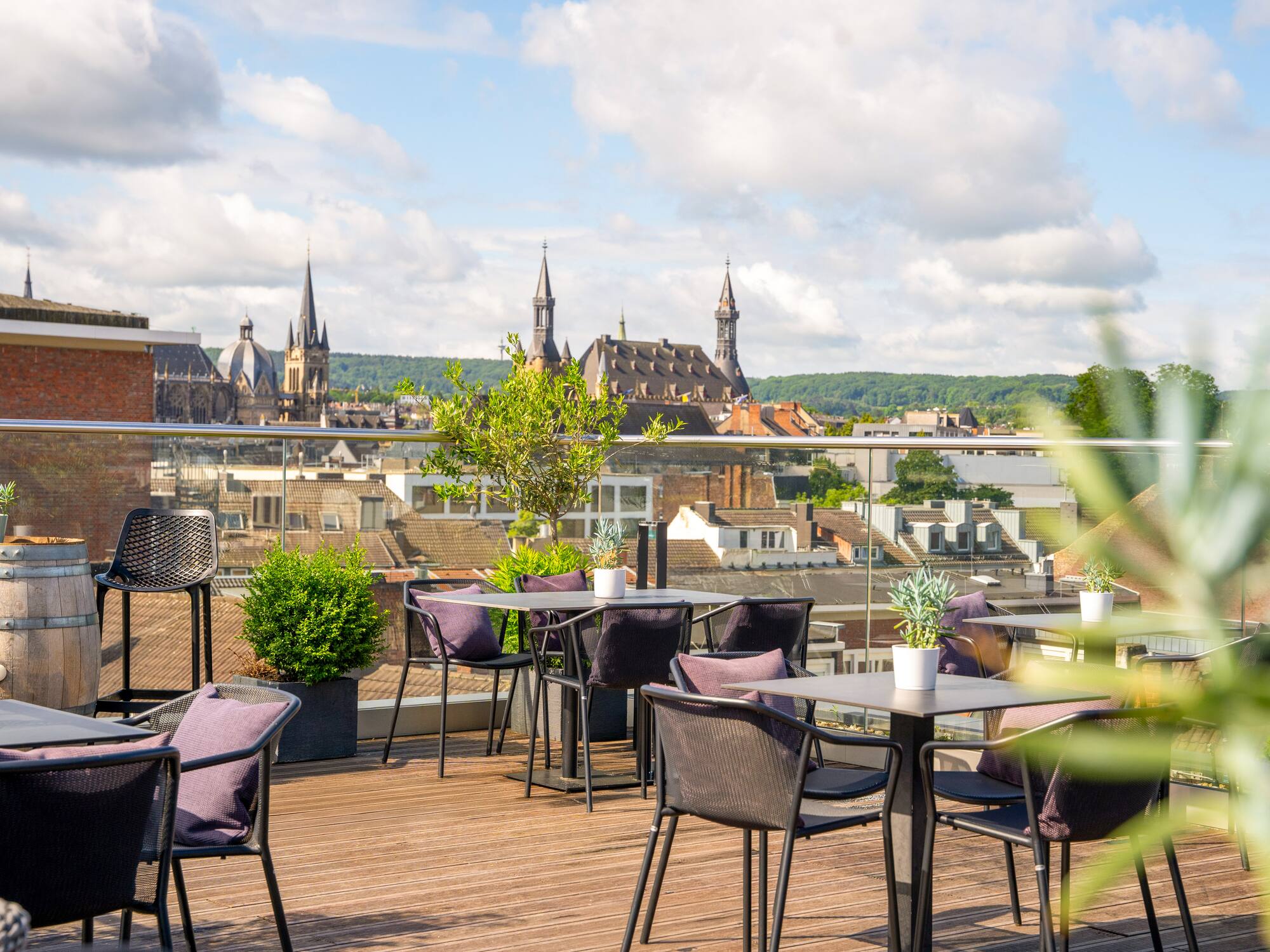 a table and chairs on a rooftop