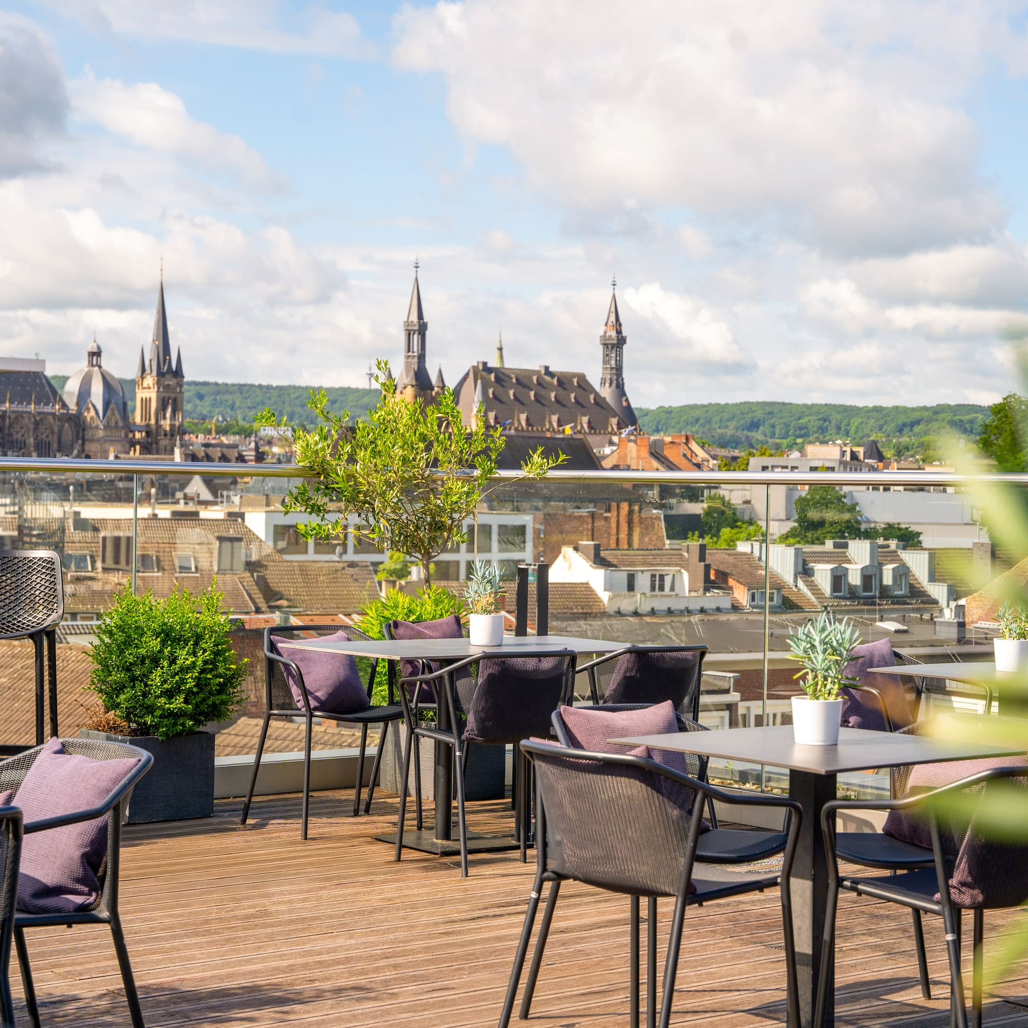 a table and chairs on a rooftop