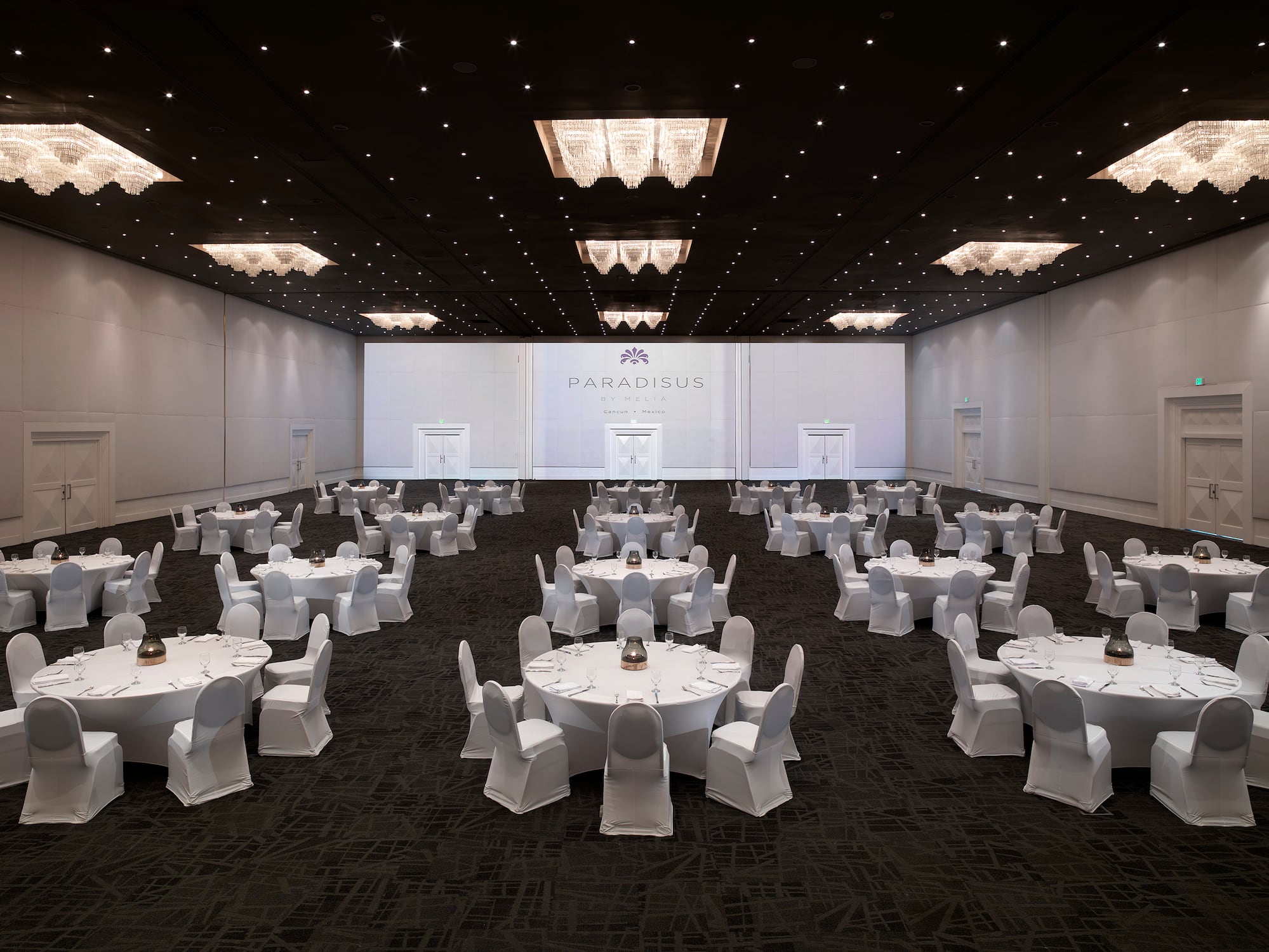 a large room with tables and chairs