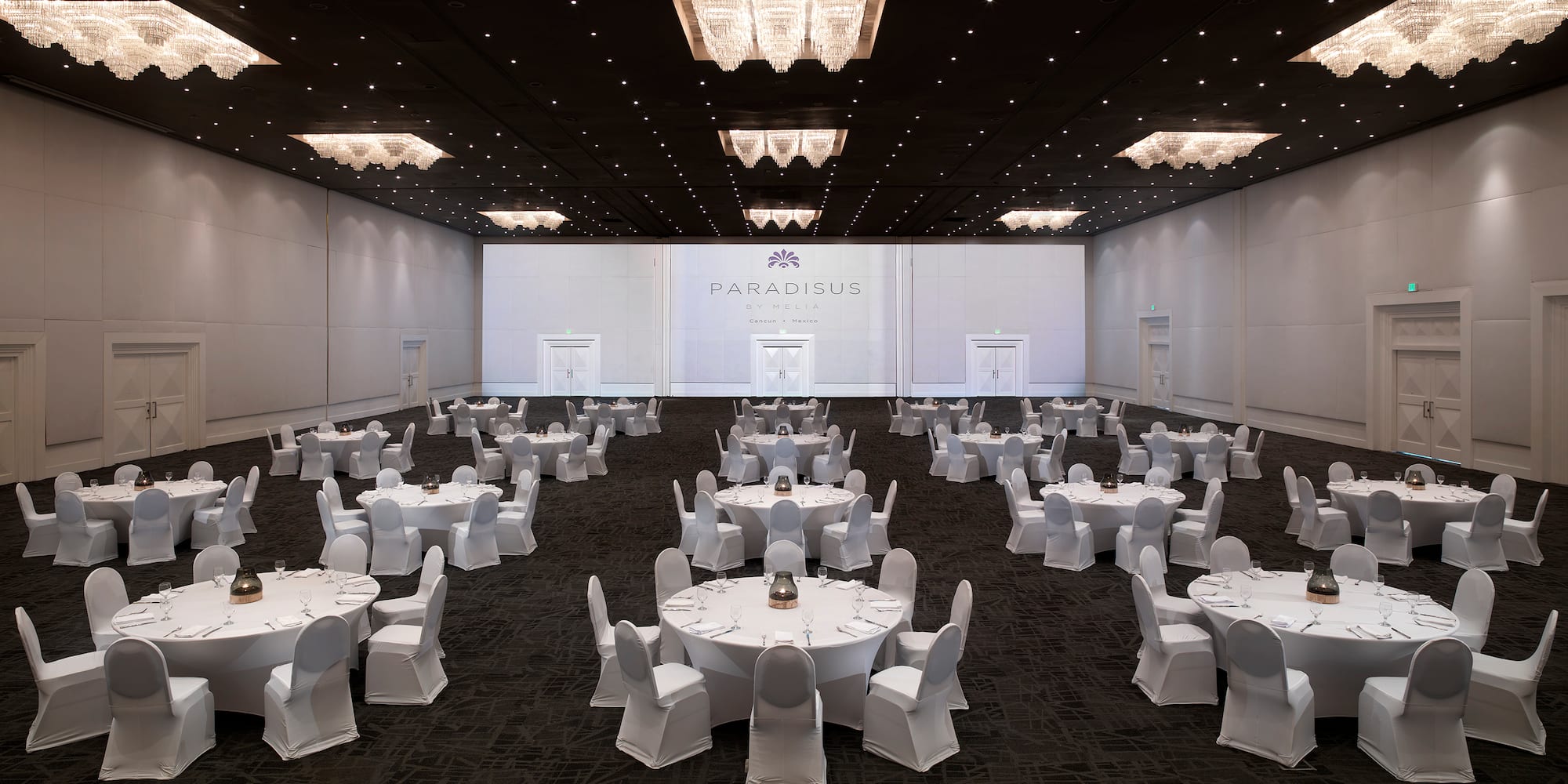 a large room with tables and chairs