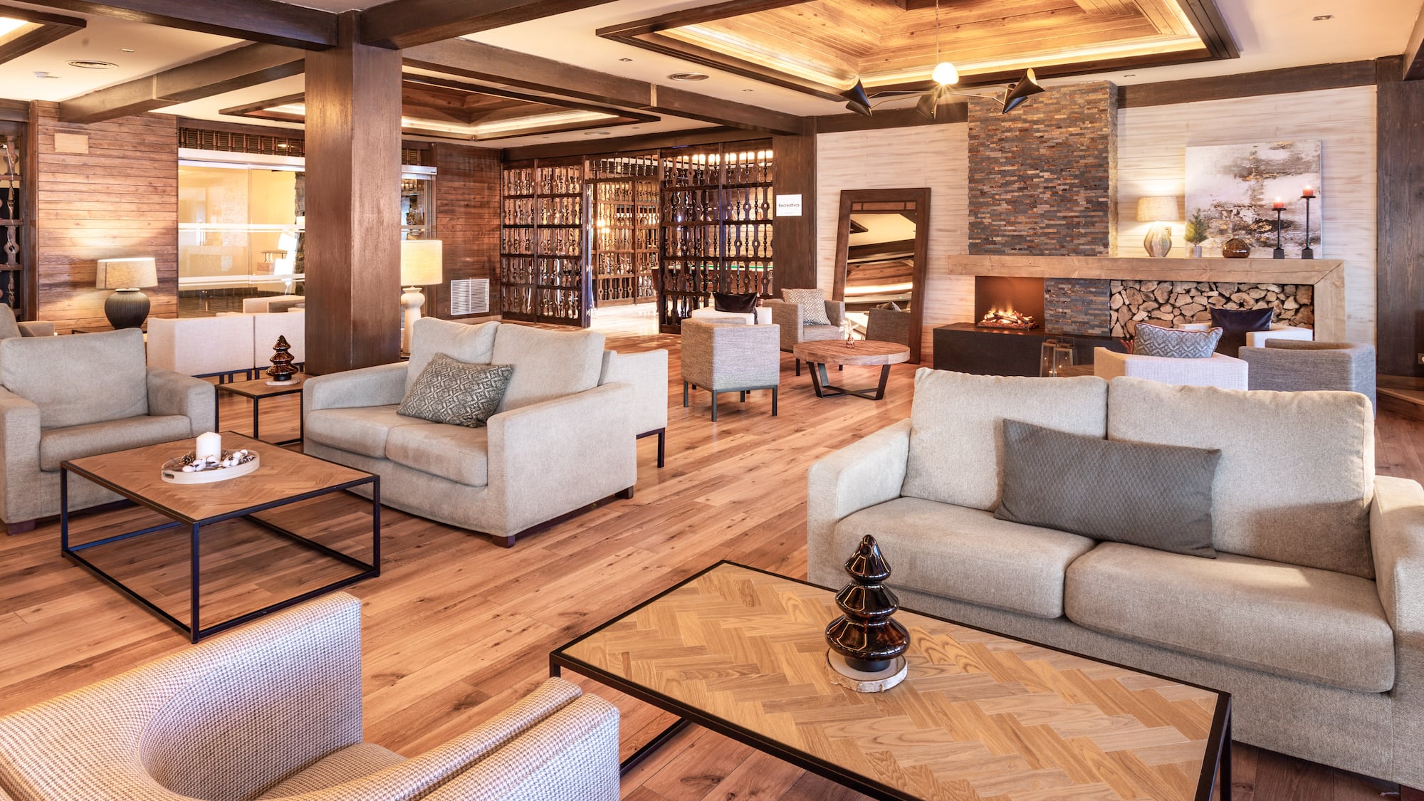 a room with couches and a fireplace