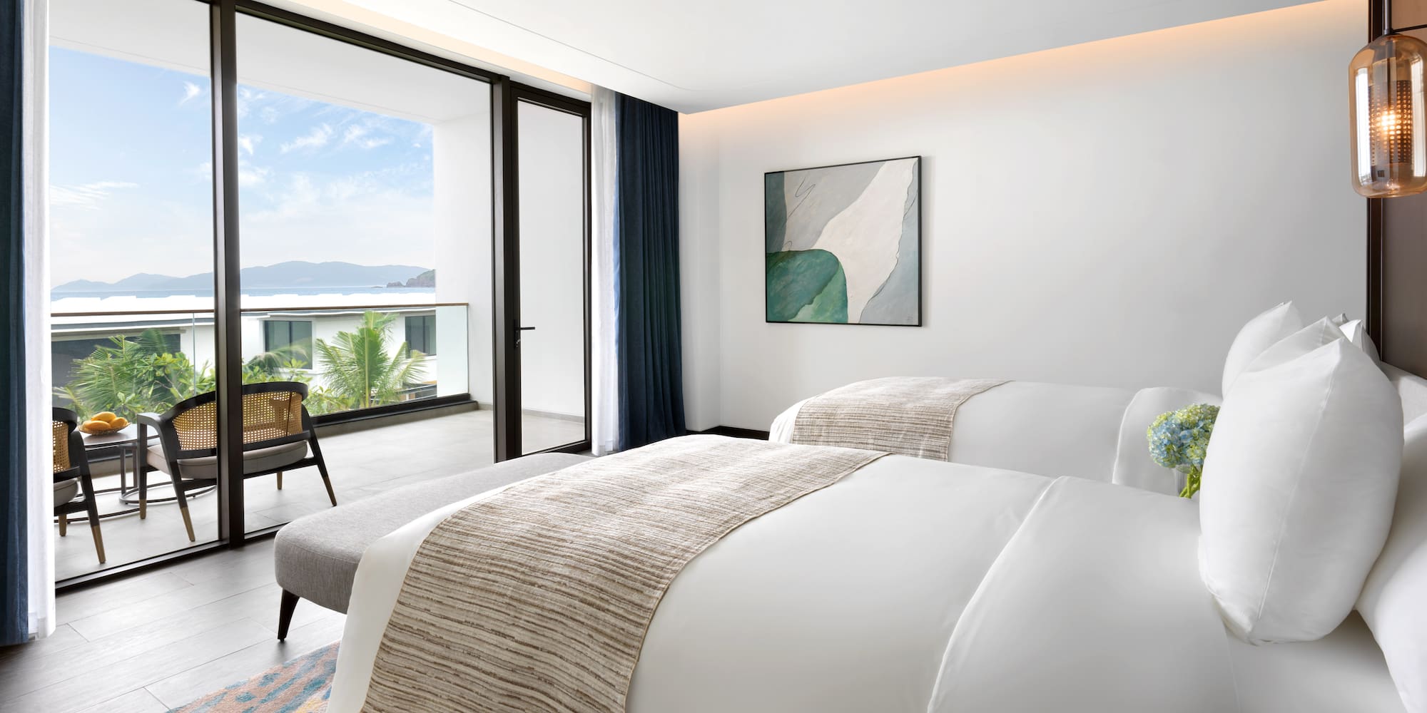 a bedroom with a chair and a bed