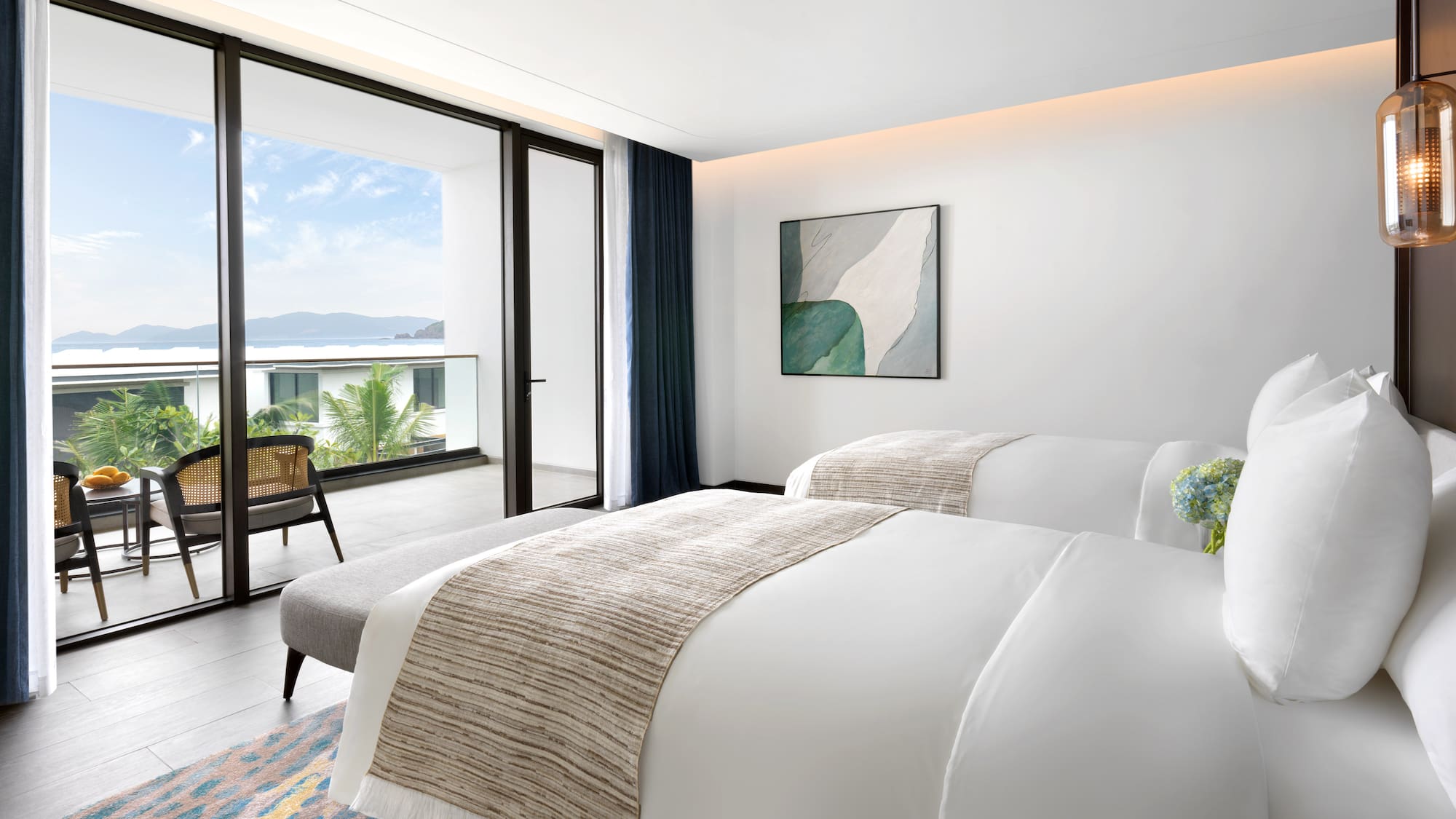 a bedroom with a chair and a bed